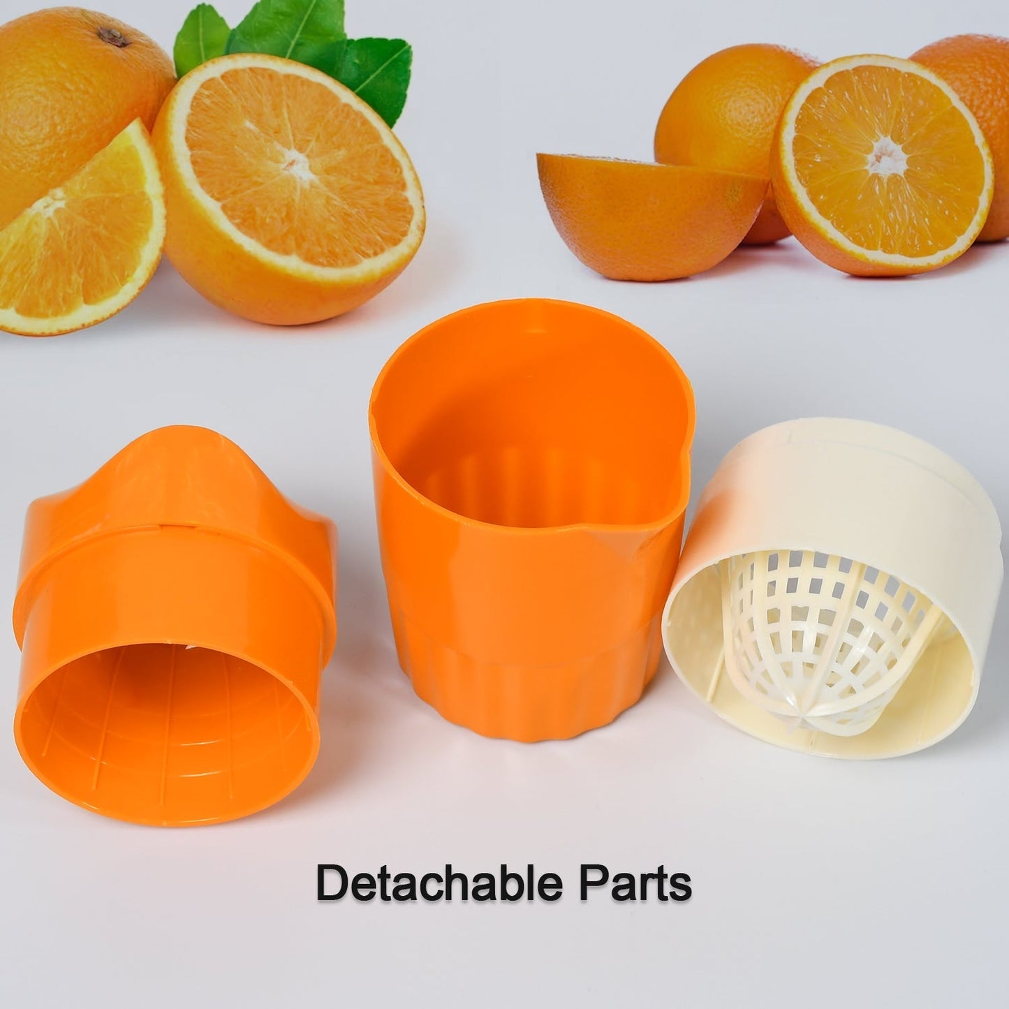 Handheld fruit juicer with metal and plastic parts