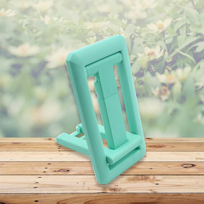 Mobile phone holder with adjustable height, foldable design