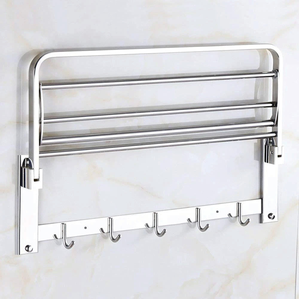 Stainless steel towel bar with foldable rack, 18 inches for compact bathroom storage.