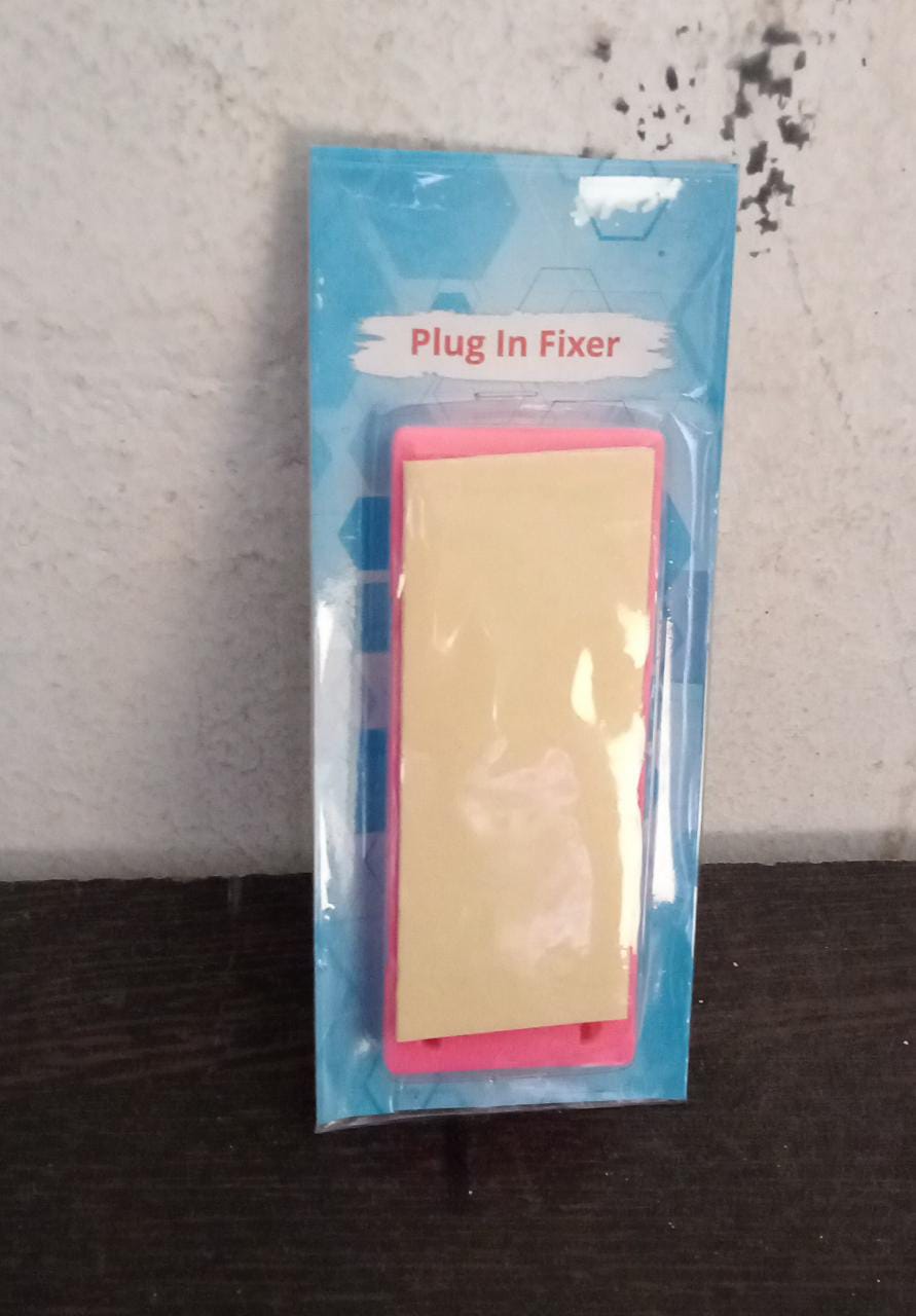 Plug organizer with reusable adhesive mount