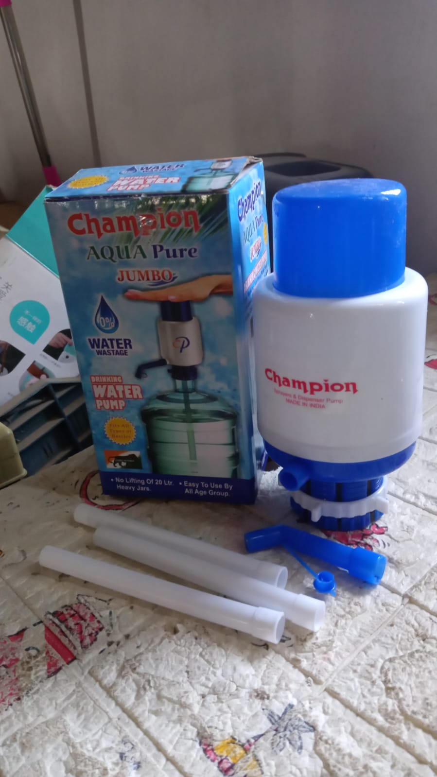 Versatile manual water pump for dispensing water from bottles, ideal for home or office use.